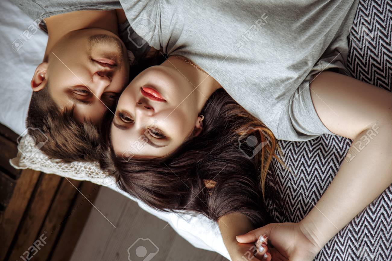 Happy Couple The Husband Hugs His Pregnant Beautiful Wife They Stock Photo Picture And Royalty Free Image Image