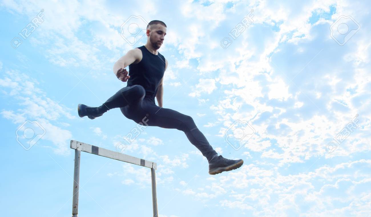 One Caucasian Male In A Jump Over A Barrier Running On The Stadium Stock Photo Picture And Royalty Free Image Image One Caucasian Male In A Jump Over A Barrier Running On The Stadium Stock Photo Picture And Royalty Free Image Image