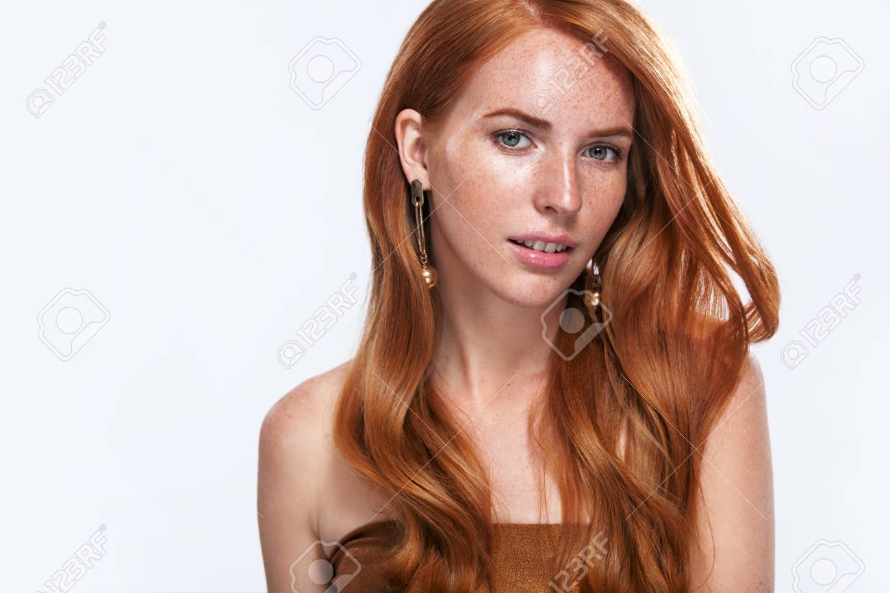 Red Head Girl With Long And Shiny Wavy Hair Beauty Beautiful