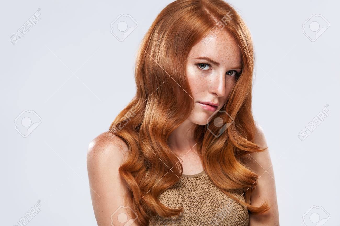 Red Head Girl With Long And Shiny Wavy Hair Beauty Beautiful