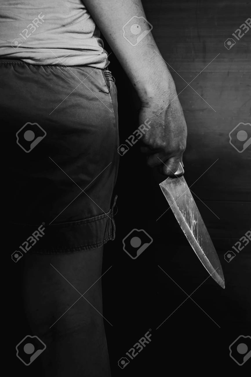 シャドウ エッジと白のトーンで殺害されたホールディング ナイフ の写真素材 画像素材 Image