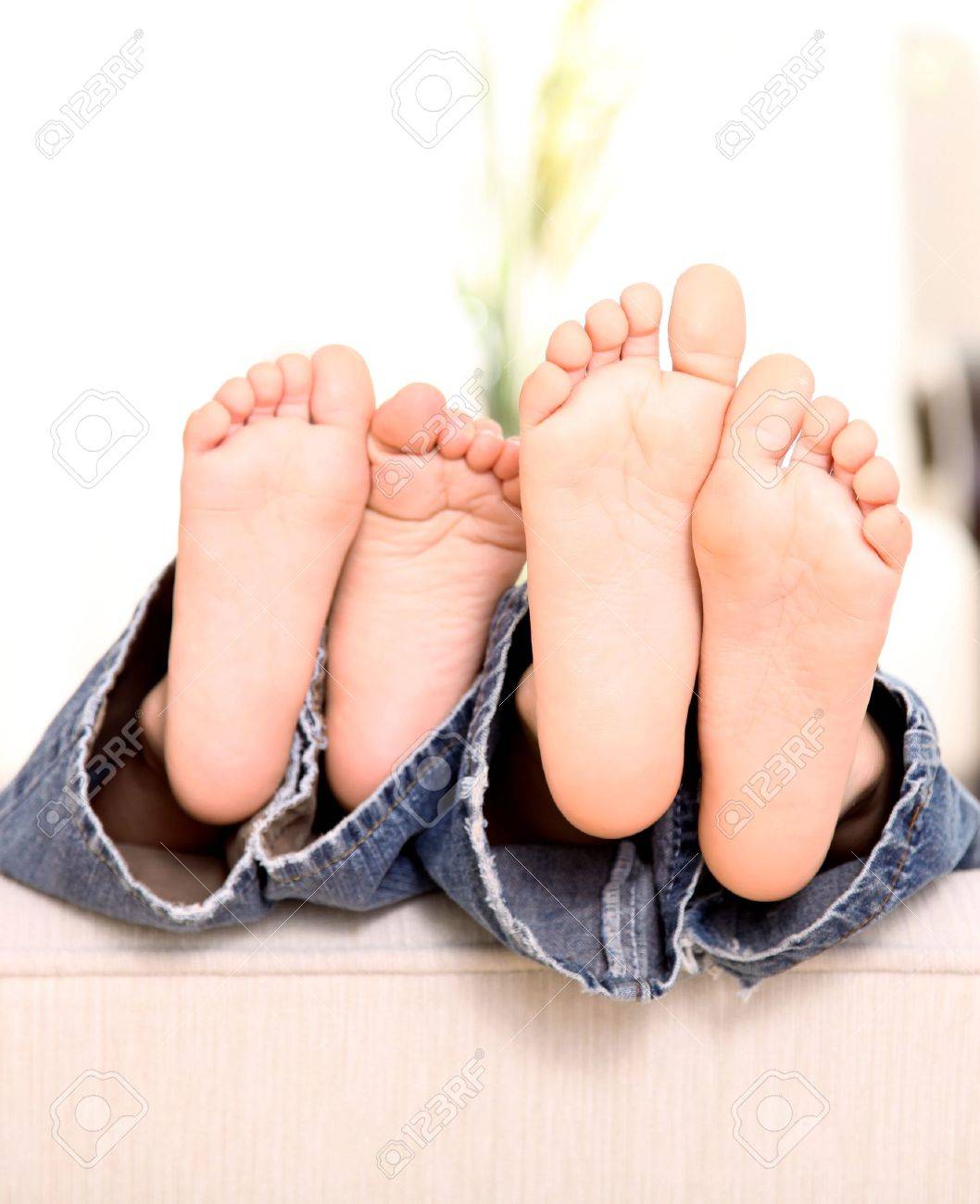 Feet Of Two Children Looking Out On A Sofa Tender And Funny Picture Stock Photo Picture And Royalty Free Image Image