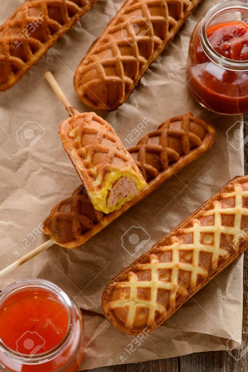 Waffle Corn Dogs On Kraft Wrapping Paper Served With Ketchup Stock Photo Picture And Royalty Free Image Image 140757428