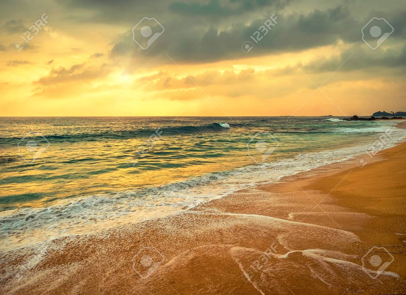 Beautiful Tropical Sea View Under Sunset Sky At Sri Lankain Beach. Stormy  Waves In Evening Time. Stock Photo, Picture and Royalty Free Image. Image  102194225., image size:1300x945