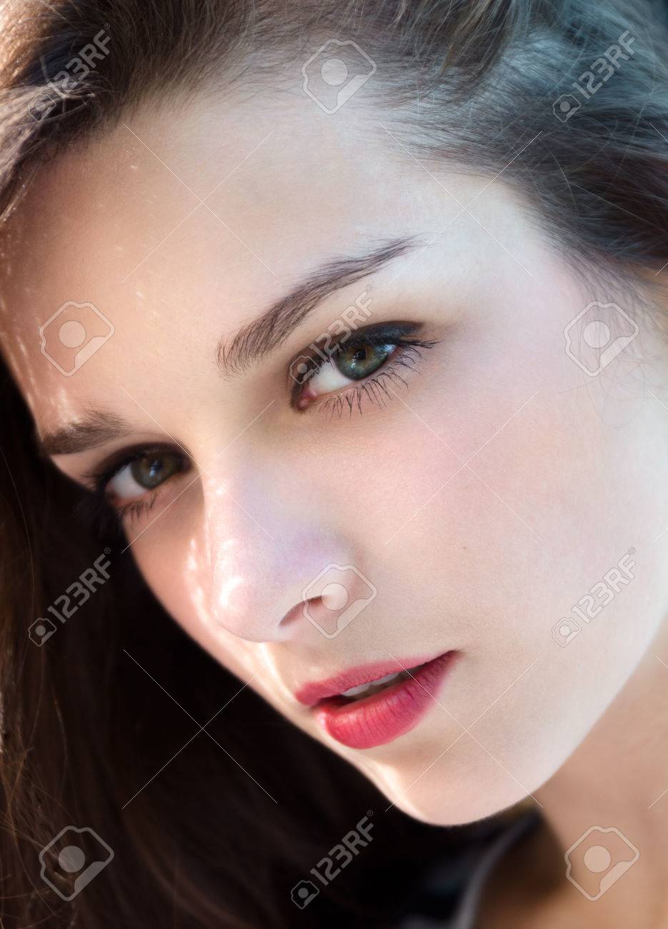 Young Girl Closeup Beauty Portrait. Natural Beauty Female Model Face. Calm  And Cute Beautiful Face With Loving Sensual Eyes Stock Photo, Picture and  Royalty Free Image. Image 60926624., image size:935x1300