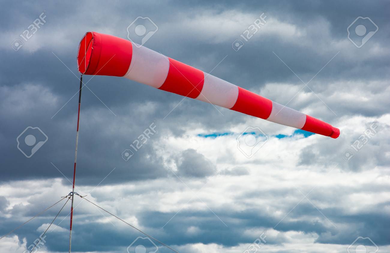 Airport Windsock On Cloudy Sky Background In Windy Weather Indicdrogueate  The Local Wind Direction (also Called: Air Sock, Drogue, Wind Sleeve, Wind  Cone) Stock Photo, Picture and Royalty Free Image. Image 101107250.