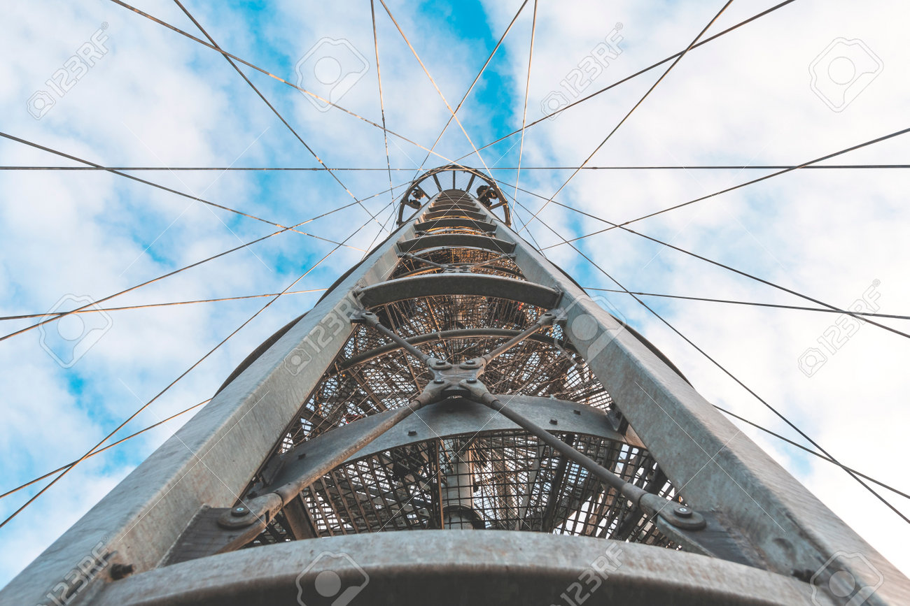 View from below on the metal structure of the lookout tower. Modern urban architecture. - 162631413 View from below on the metal structure of the lookout tower. Modern urban architecture. - 162631413