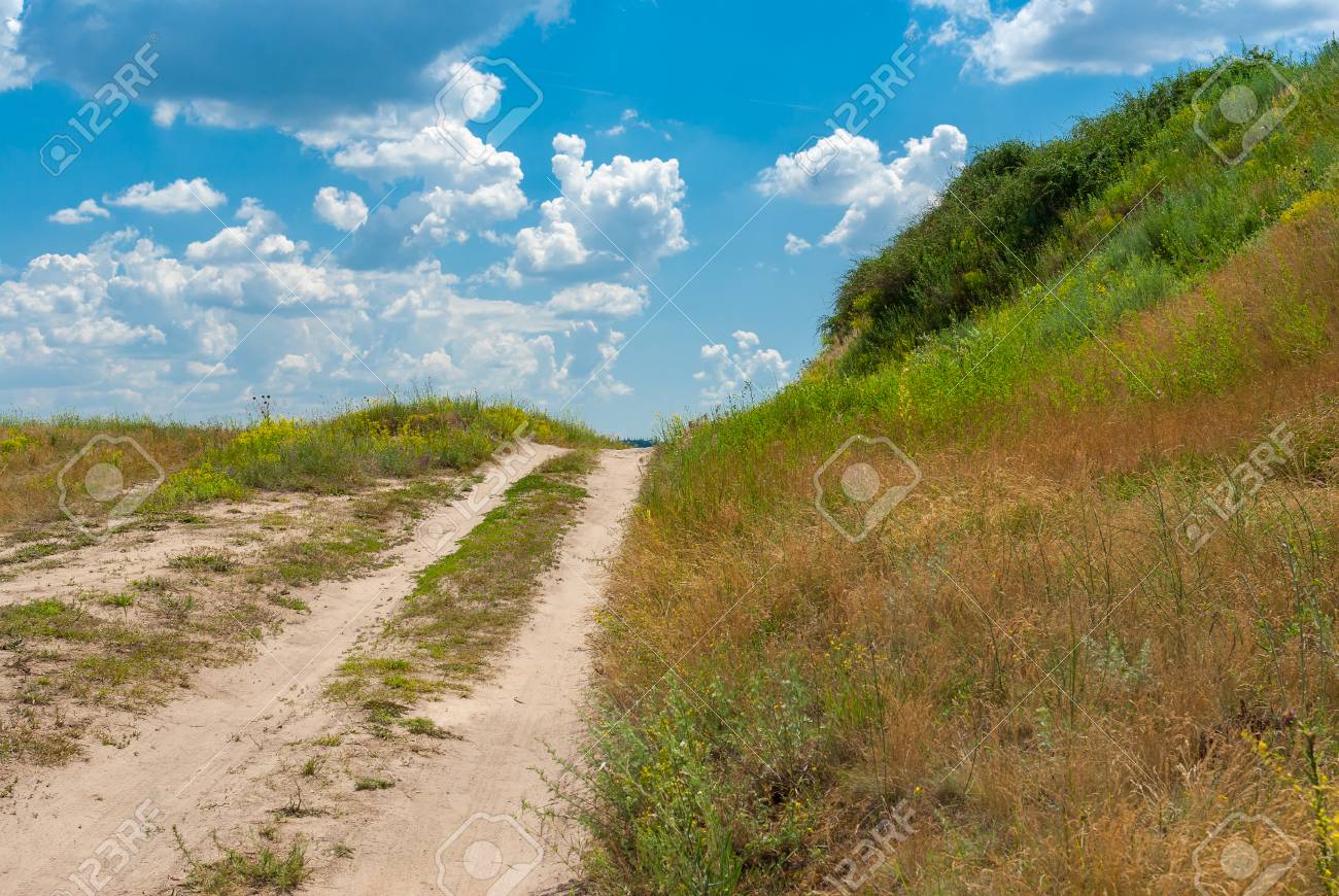 Sandy Country Road Leading On A Hill At Summer Season In Ukraine - 