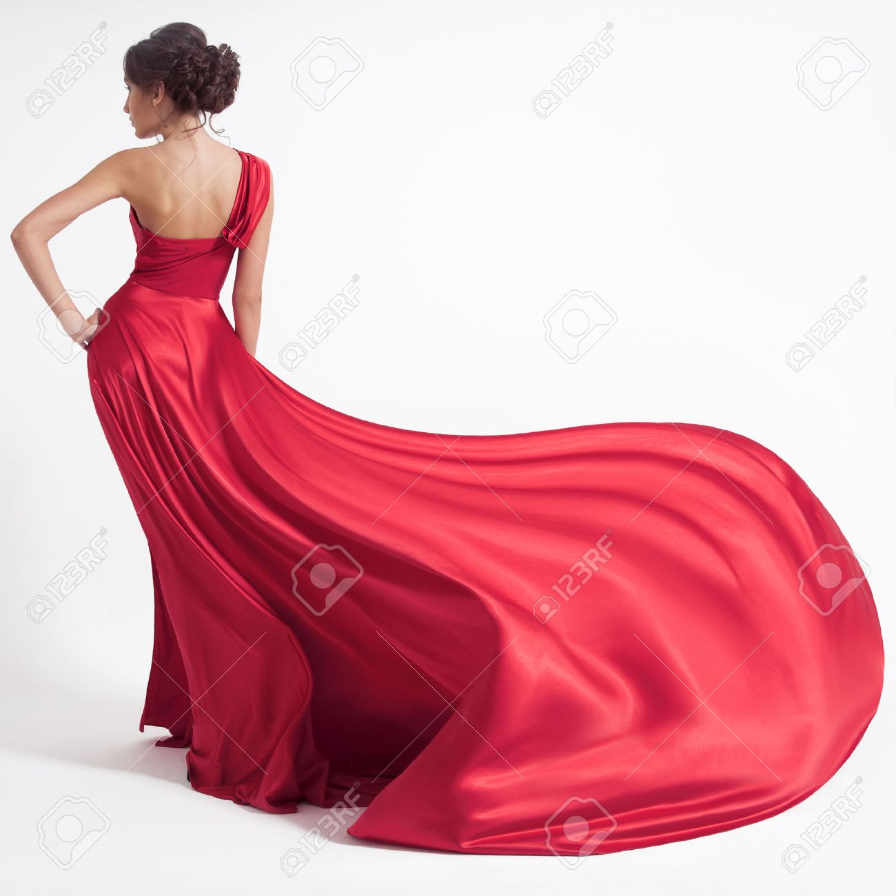 Young beauty woman in fluttering red dress. White background. - 37538089 Young beauty woman in fluttering red dress. White background. - 37538089