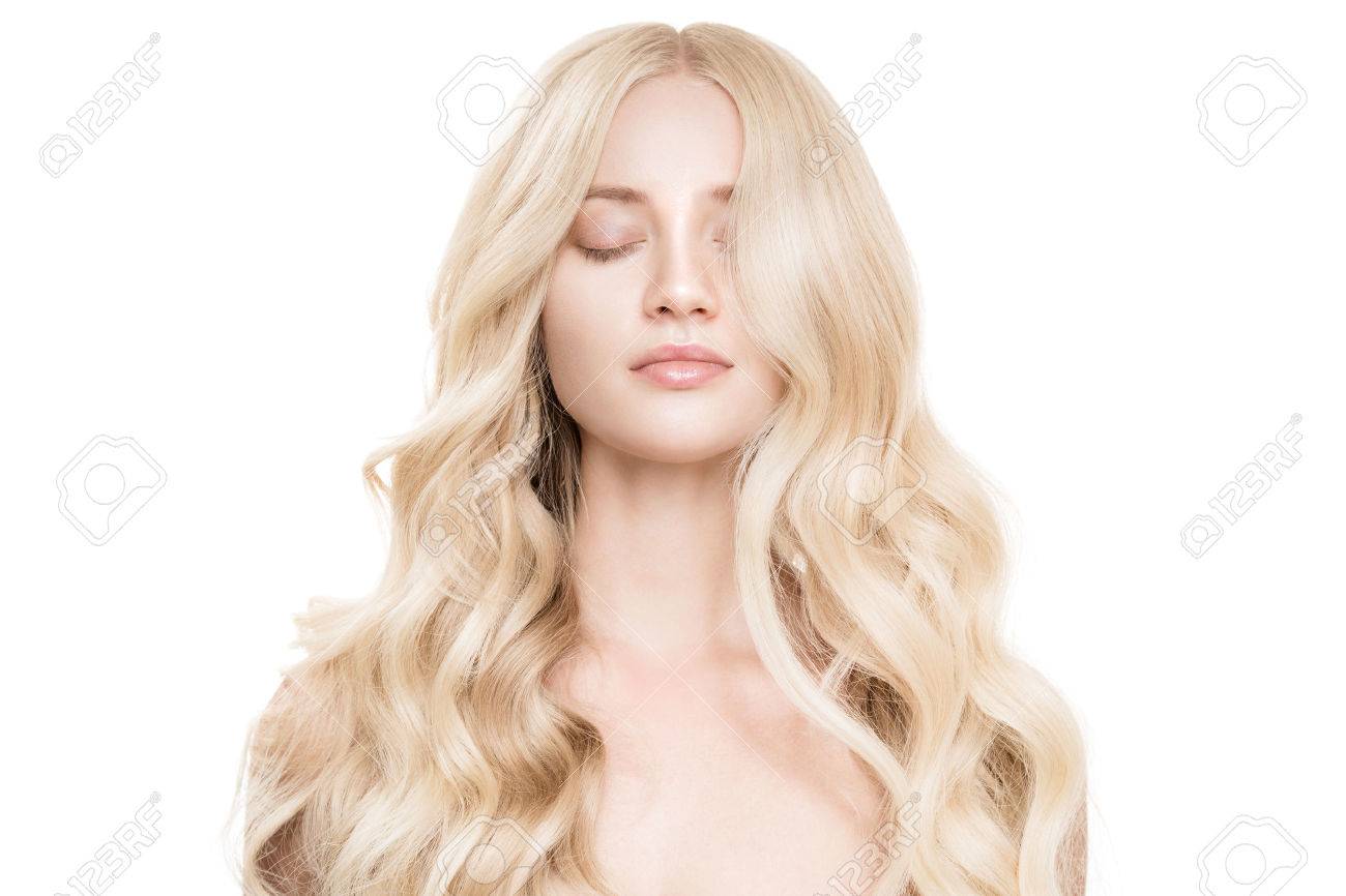 Portrait Of Beautiful Young Blond Woman With Long Wavy Hair. - 69890413 Portrait Of Beautiful Young Blond Woman With Long Wavy Hair. - 69890413