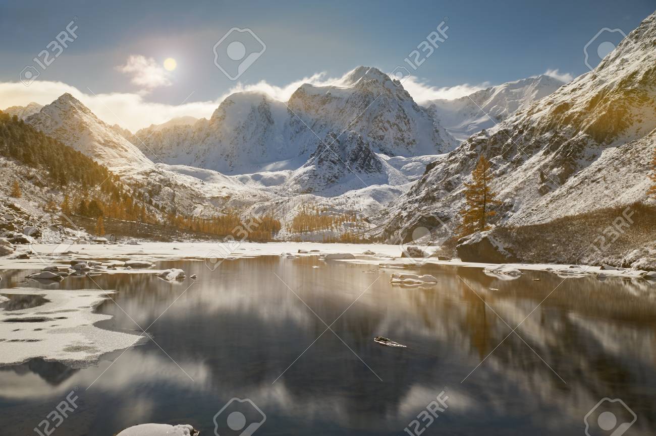 Snow-covered winter mountain lake, Russia, Siberia, Altai mountains, Chuya ridge. - 120815099 Snow-covered winter mountain lake, Russia, Siberia, Altai mountains, Chuya ridge. - 120815099