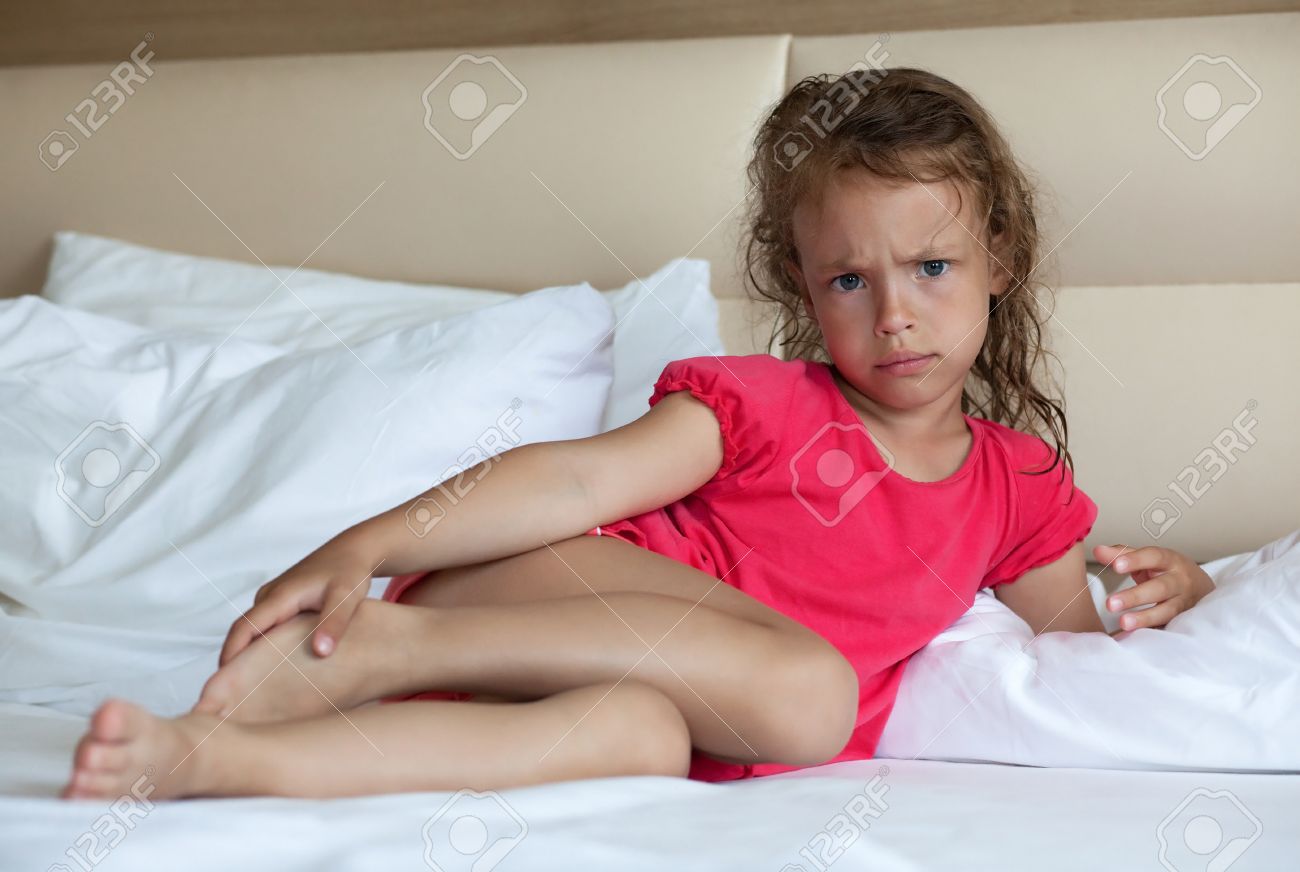 little girl on bed