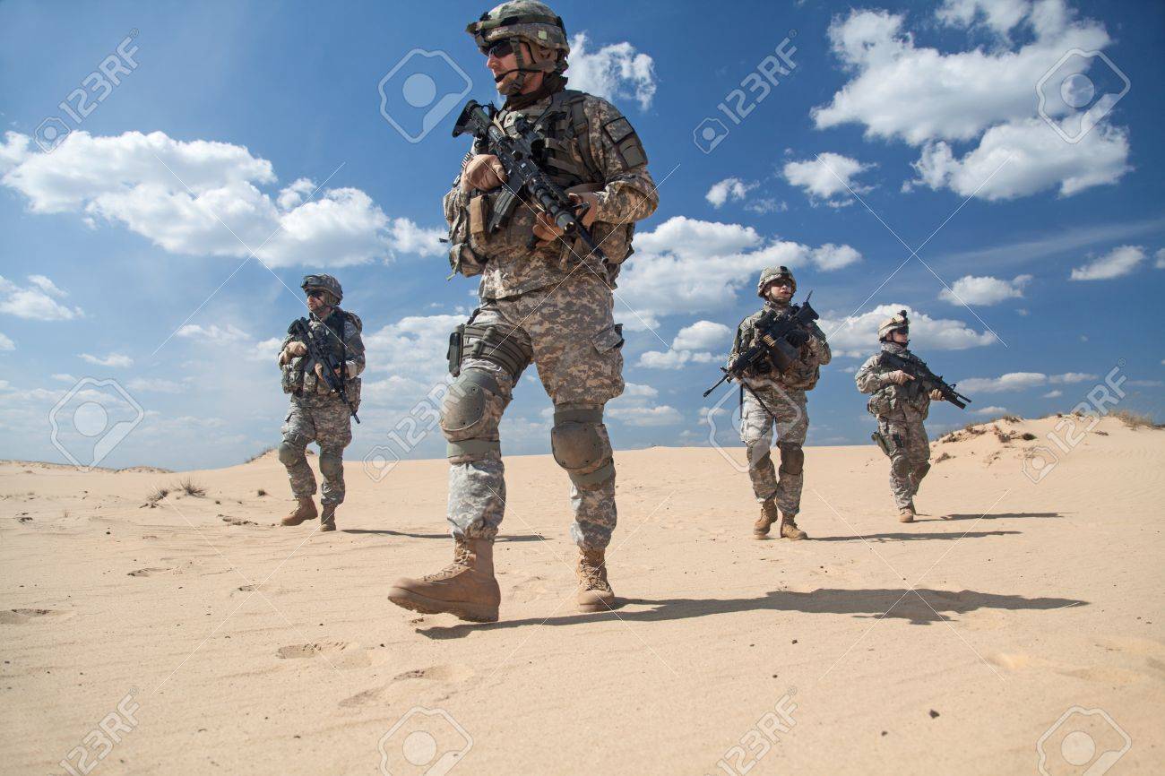 United States paratroopers airborne infantrymen in action in the desert - 41199417 United States paratroopers airborne infantrymen in action in the desert - 41199417
