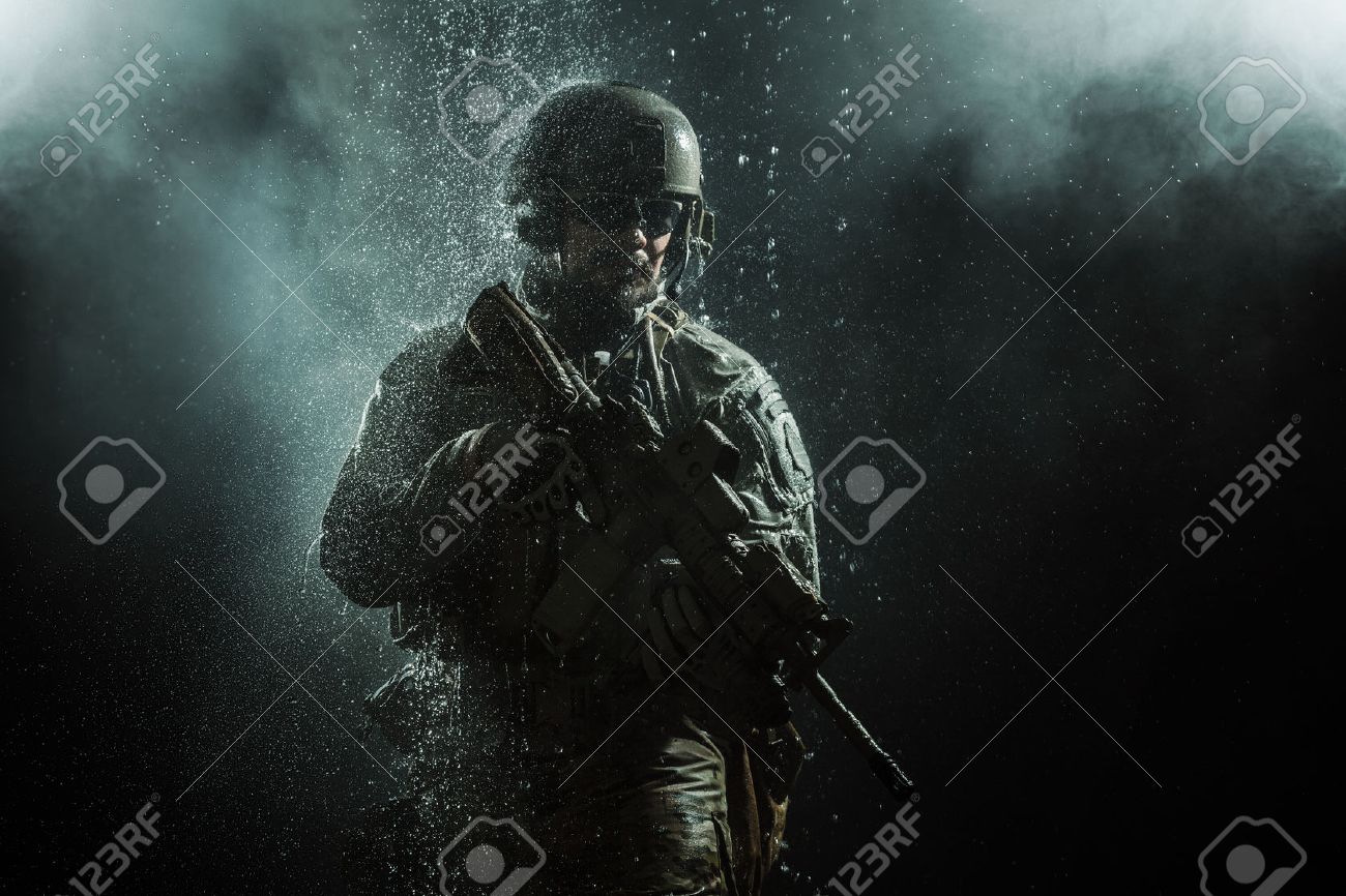 Green Berets US Army Special Forces Group soldier in the rain - 53558366 Green Berets US Army Special Forces Group soldier in the rain - 53558366