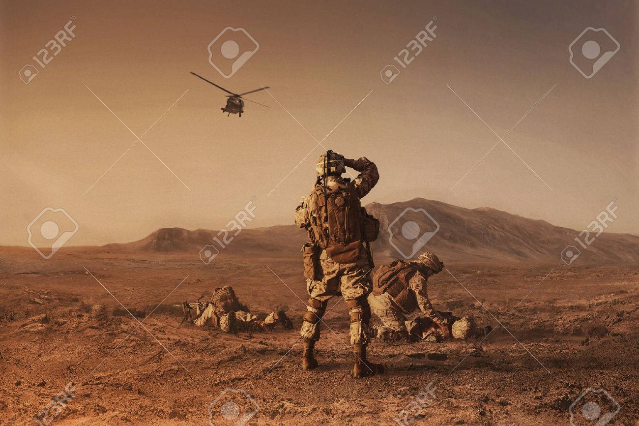 Squad of US marines waiting for medevac bird - 65419763 Squad of US marines waiting for medevac bird - 65419763