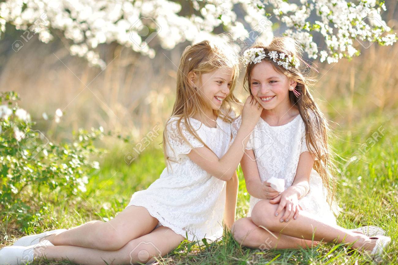 Portrait of two little girls girlfriends spring - 51750533 Portrait of two little girls girlfriends spring - 51750533