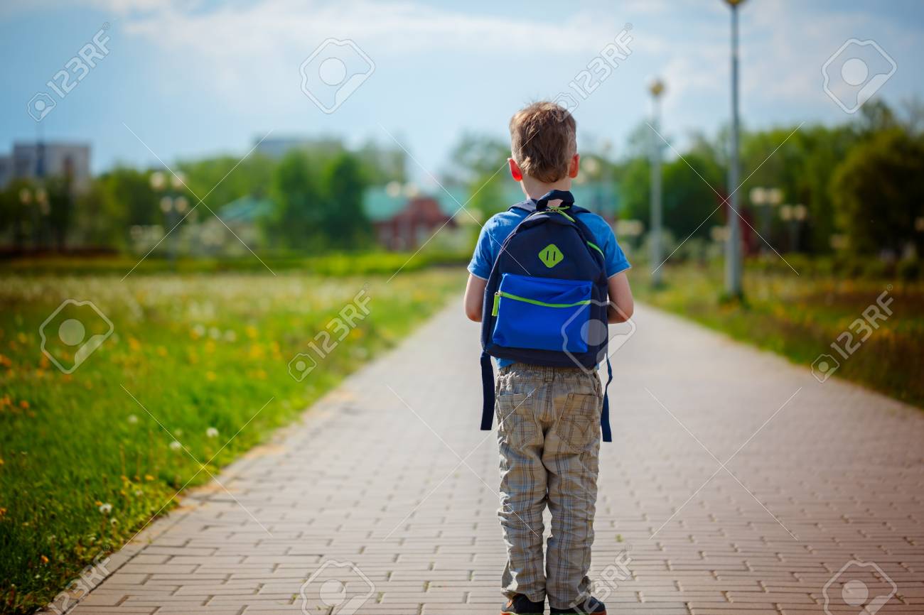 the boy with the backpack