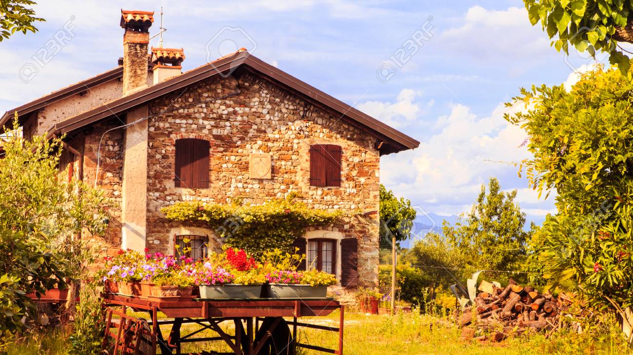 An Old Farm In The Italian Countryside With Flowers In Its Garden Stock  Photo, Picture and Royalty Free Image. Image 83524181., image size:1300x731
