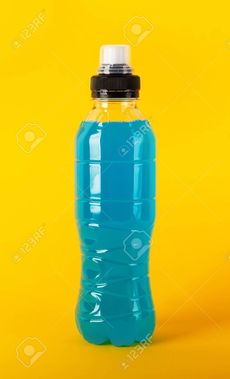 Isotonic Energy Drink Bottles With Blue Transparent Liquid Sport Beverage On A Yellow Stock Photo Picture And Royalty Free Image Image