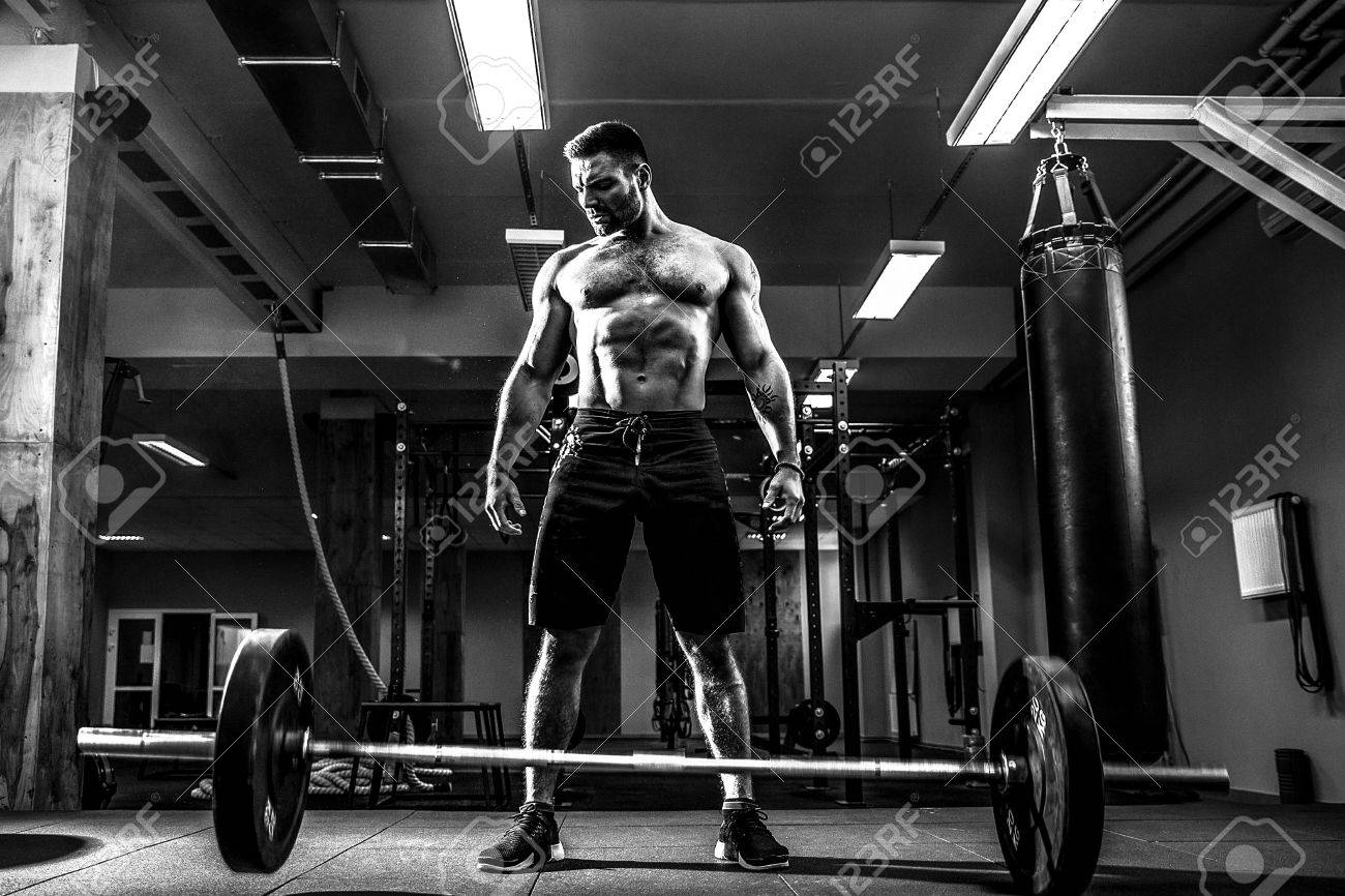 Muscular Fitness Man Threw The Bar On The Floor After Deadlift