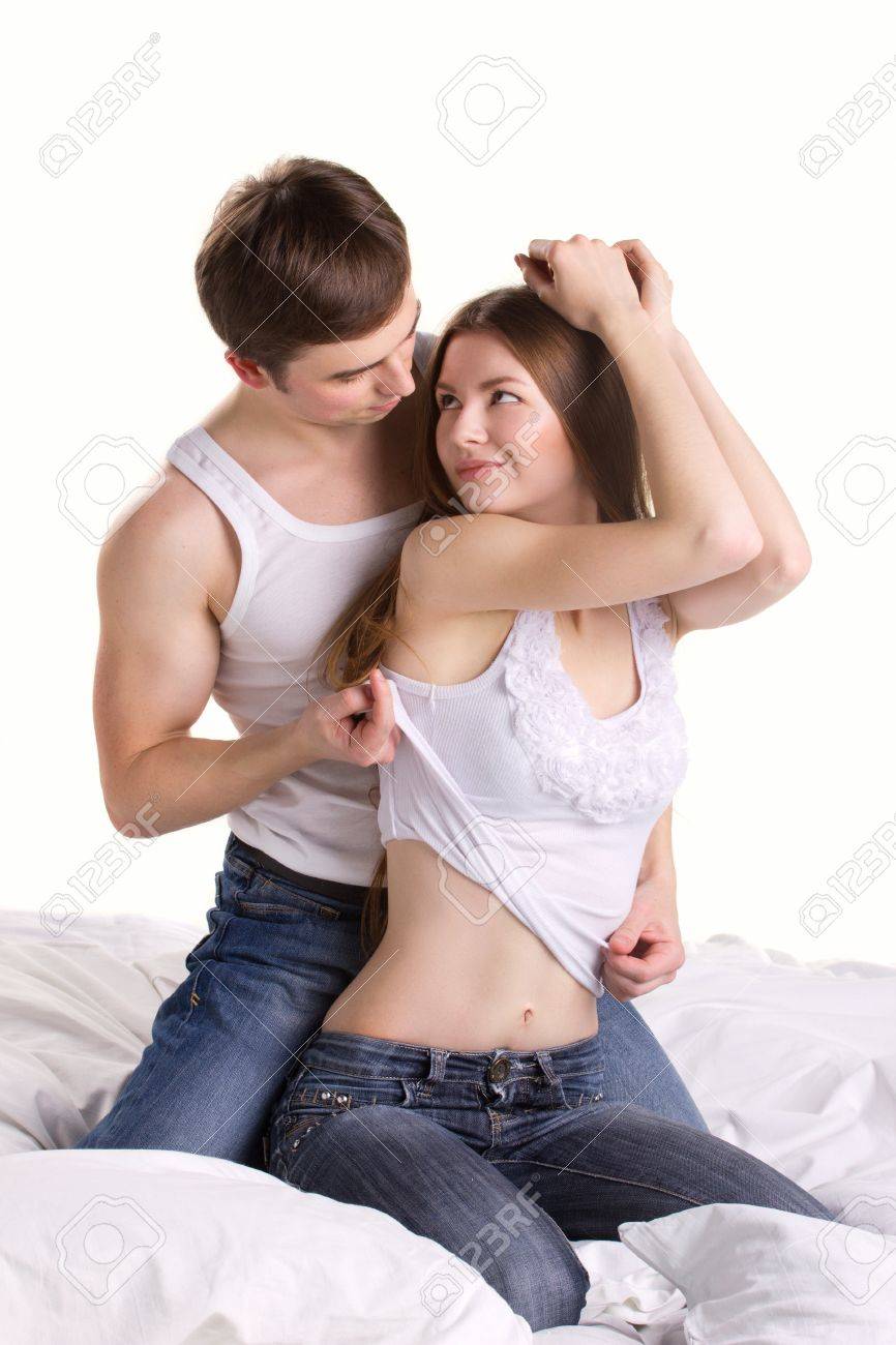 Man undressing a woman