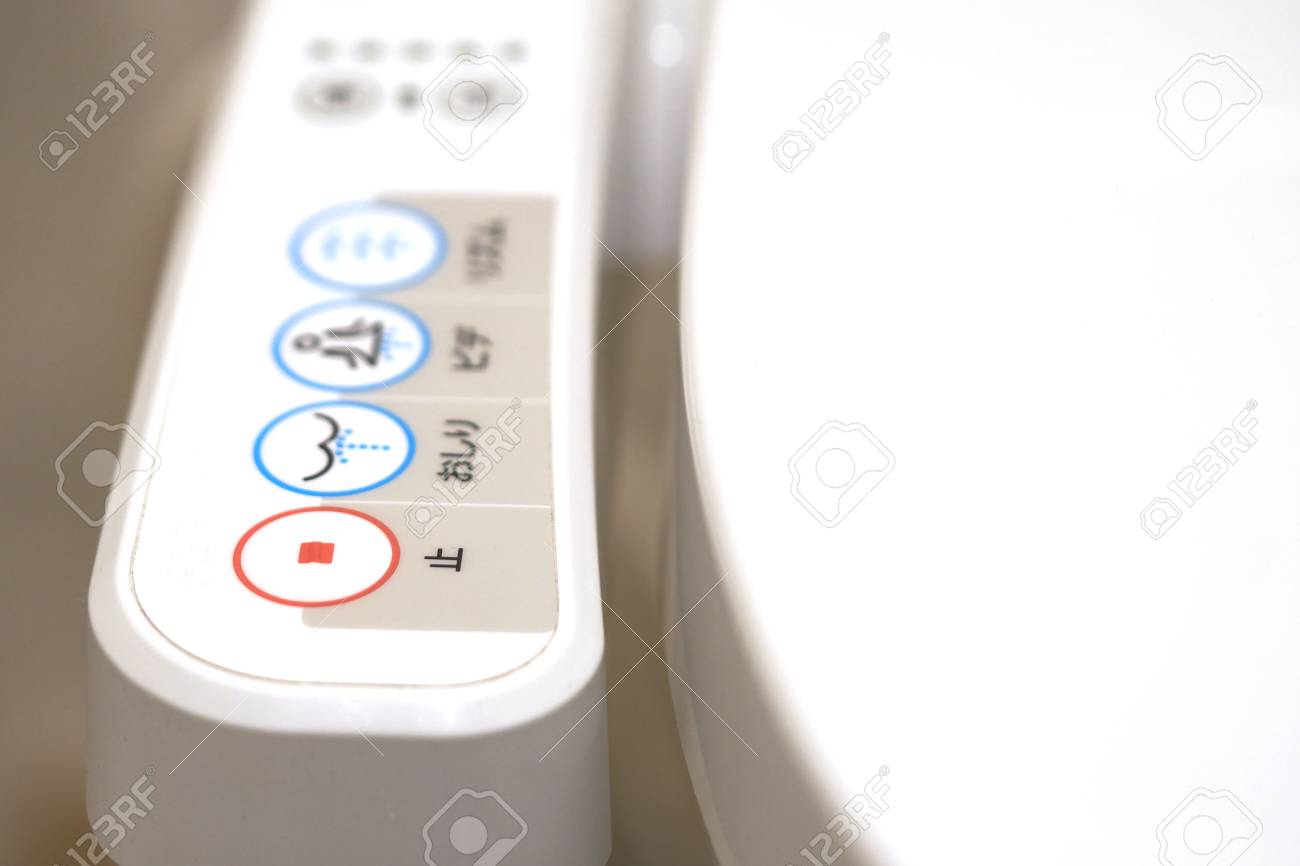 Modern high tech toilet with electronic bidet in Japan. Industry leaders recently agreed on signage standards for Japanes - 98111749 Modern high tech toilet with electronic bidet in Japan. Industry leaders recently agreed on signage standards for Japanes - 98111749