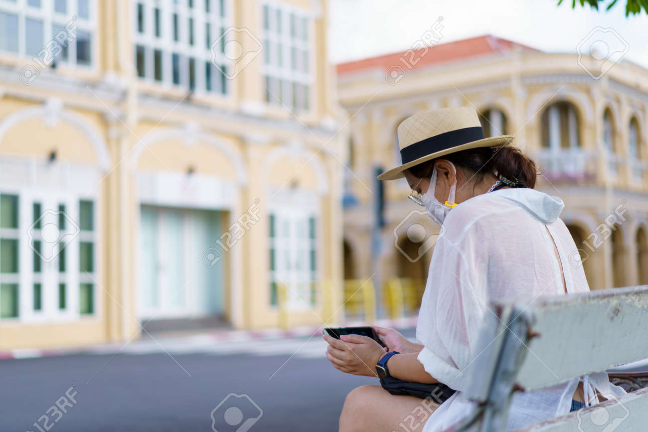 Travelers on street Phuket old town with Building Sino Portuguese architecture at Phuket Old Town area Phuket, Thailand. Travel concept - 170939265 Travelers on street Phuket old town with Building Sino Portuguese architecture at Phuket Old Town area Phuket, Thailand. Travel concept - 170939265