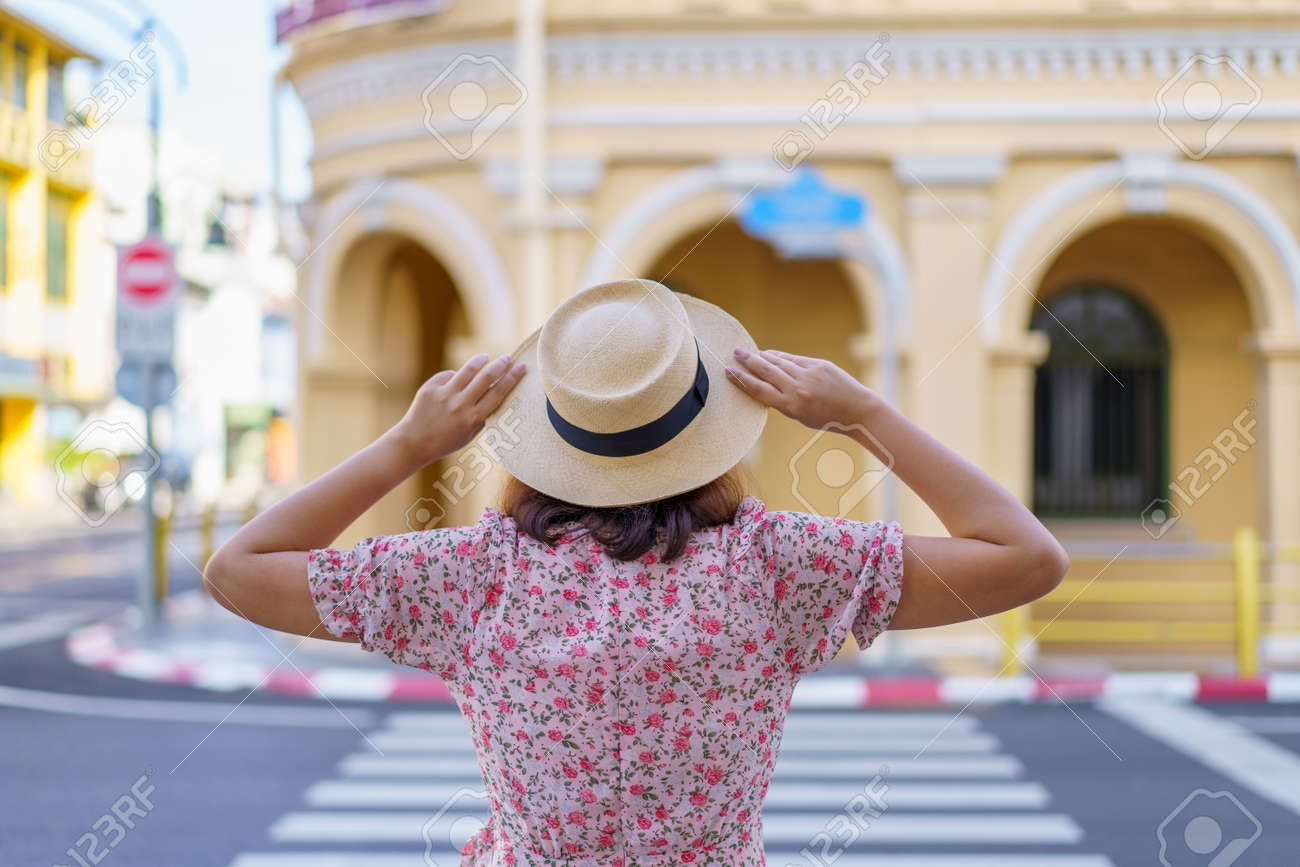 Travelers on street Phuket old town with Building Sino Portuguese architecture at Phuket Old Town area Phuket, Thailand. Travel concept - 171027717 Travelers on street Phuket old town with Building Sino Portuguese architecture at Phuket Old Town area Phuket, Thailand. Travel concept - 171027717