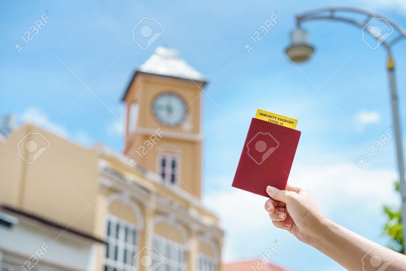 Passport with vaccination certificate for COVID-19 person record card. Immune passport or certificate for Get vaccinated before travel. Vaccination, disease immunity passport - 171394283 Passport with vaccination certificate for COVID-19 person record card. Immune passport or certificate for Get vaccinated before travel. Vaccination, disease immunity passport - 171394283