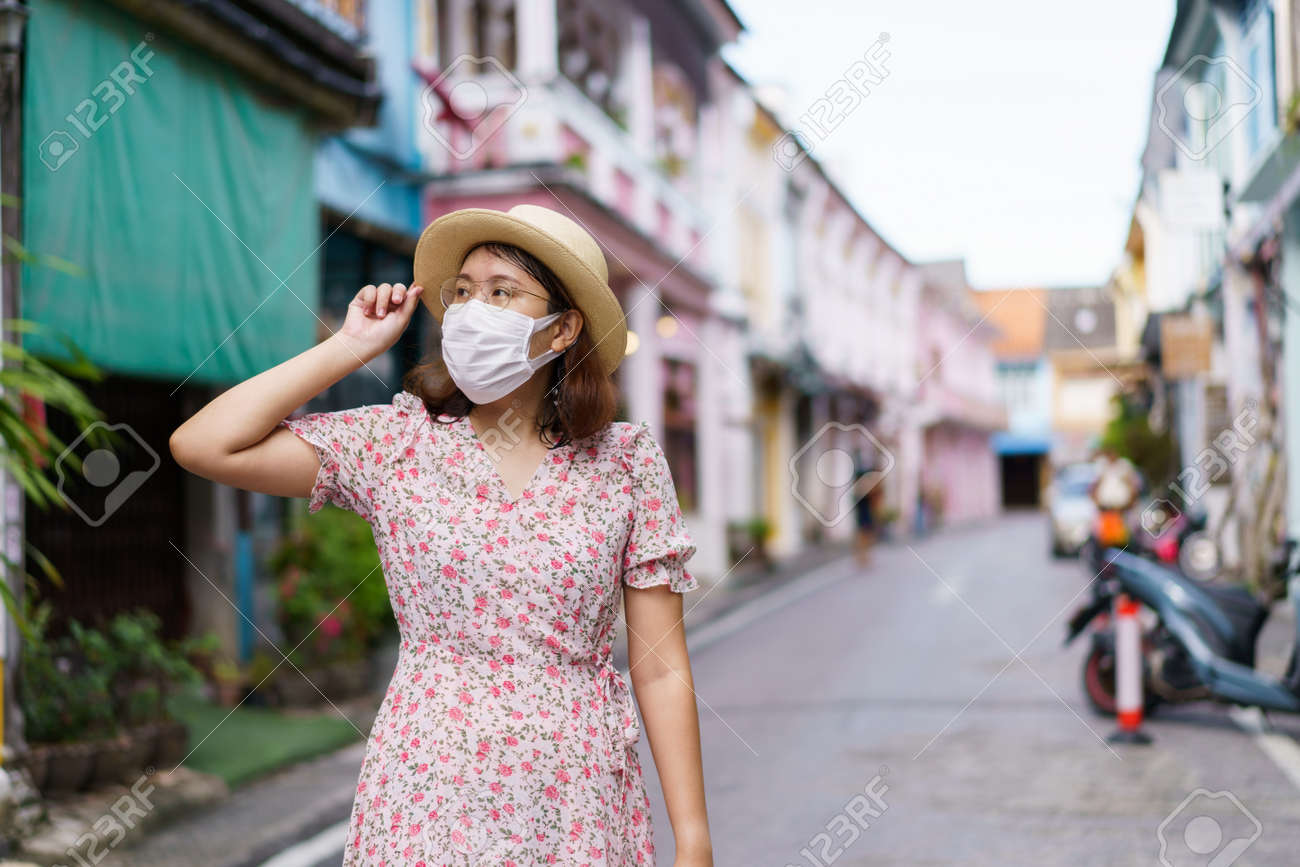 Travelers on street Phuket old town with Building Sino Portuguese architecture at Phuket Old Town area Phuket, Thailand. Travel concept - 171315218 Travelers on street Phuket old town with Building Sino Portuguese architecture at Phuket Old Town area Phuket, Thailand. Travel concept - 171315218