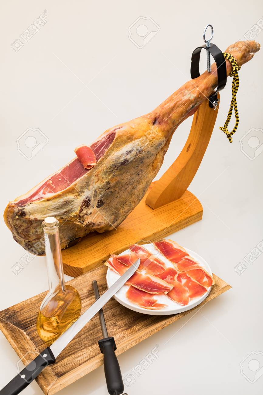 Spanish Serrano Ham On The Leg With Wood Holder Isolated Stock Photo Picture And Royalty Free Image Image 96157978