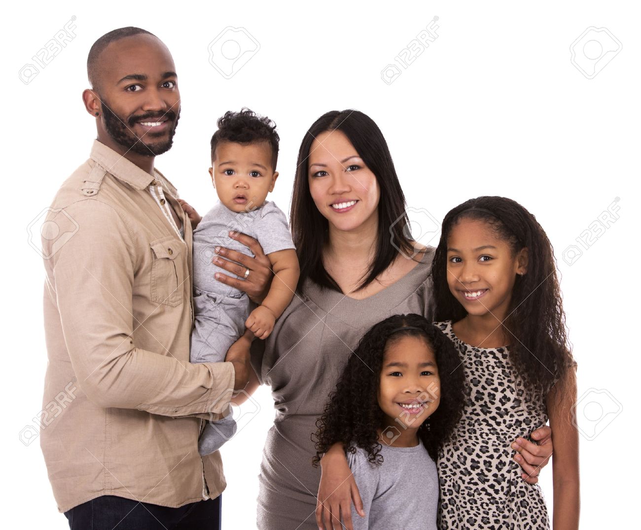 casual young mixed family on white isolated background - 50756234 casual young mixed family on white isolated background - 50756234