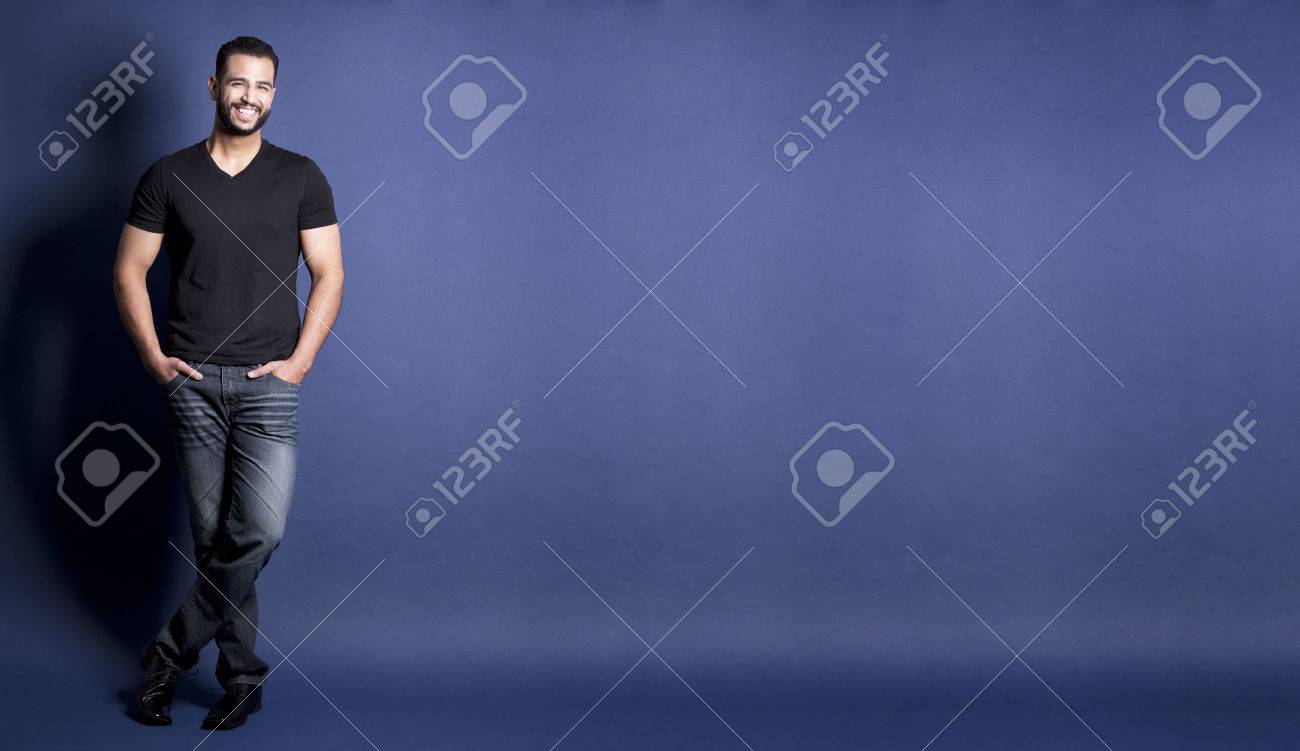 east asian handsome man wearing black tshirt and jeans - 56911586 east asian handsome man wearing black tshirt and jeans - 56911586