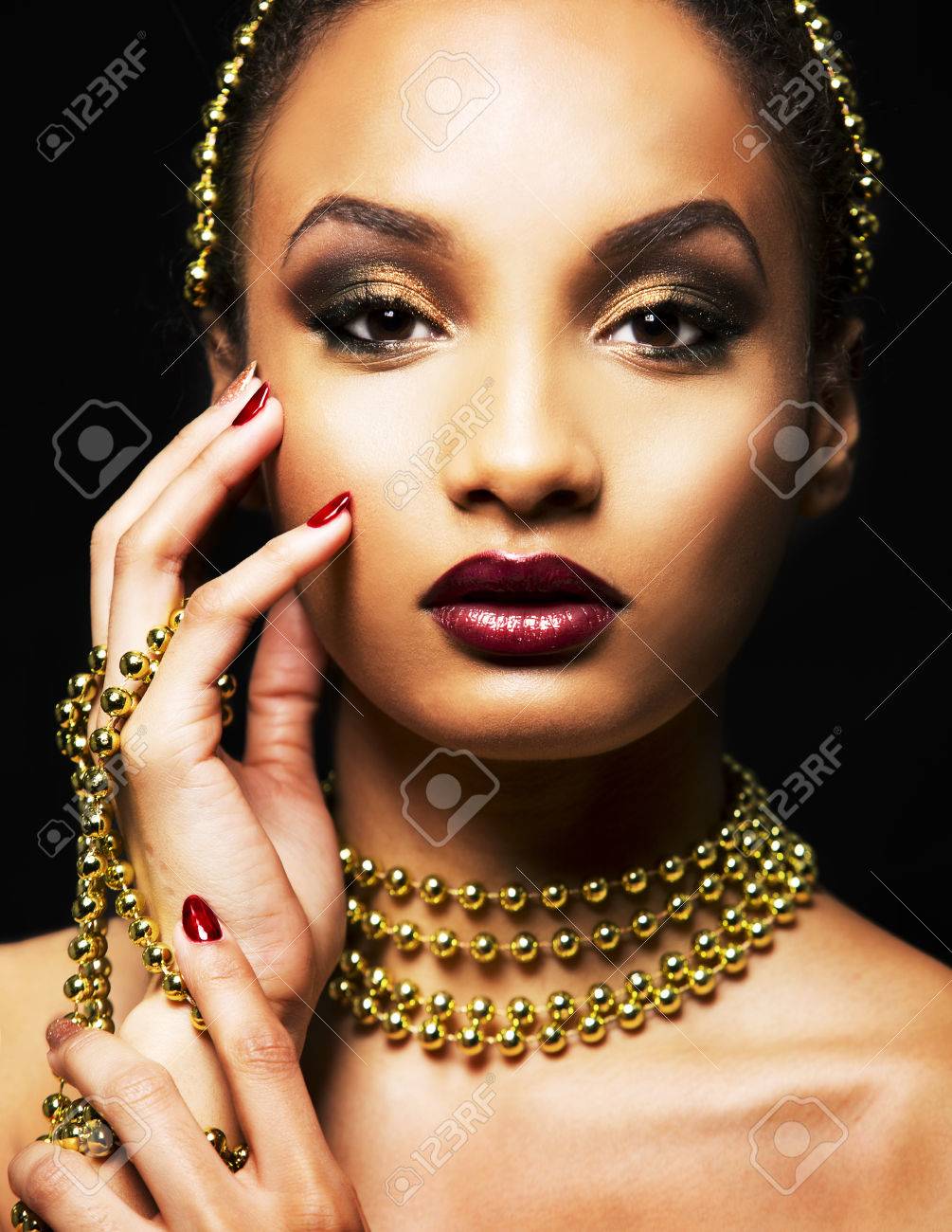 girl wearing gold jewellery
