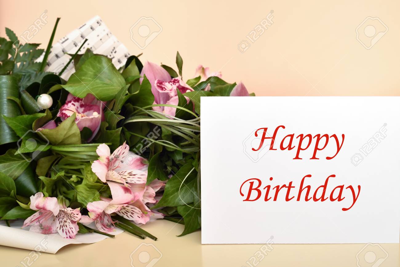 Bouquet Of Flowers And Greeting Card With Happy Birthday Message ...