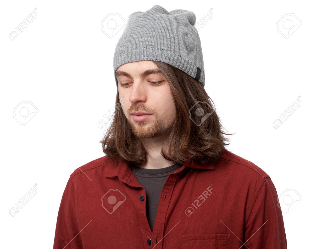 Portrait Of A Young Handsome Man With Long Hair And Beard In