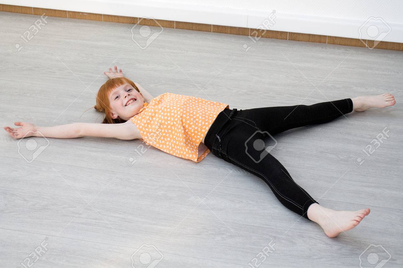 Little Redheaded Girl Laying On The Floor Looking Into The Camera Stock Photo Picture And Royalty Free Image Image Little Redheaded Girl Laying On The Floor Looking Into The Camera Stock Photo Picture And Royalty Free Image Image