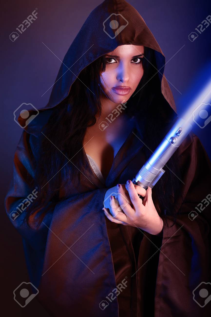 holding lightsaber