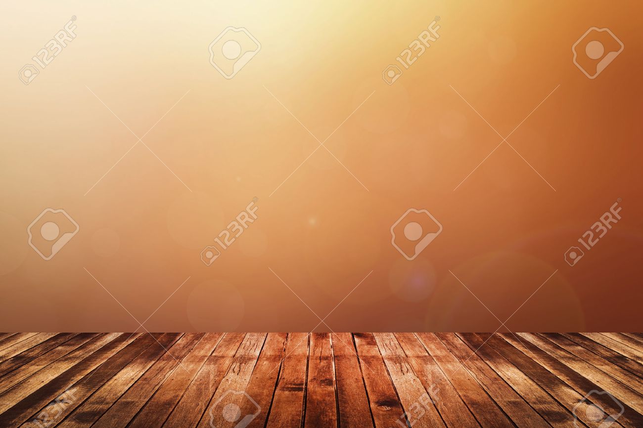 Dark brown wooden floor with abstract blurred background in warm tone color red, orange and yellow. use for backdrop or web design - 43218943 Dark brown wooden floor with abstract blurred background in warm tone color red, orange and yellow. use for backdrop or web design - 43218943