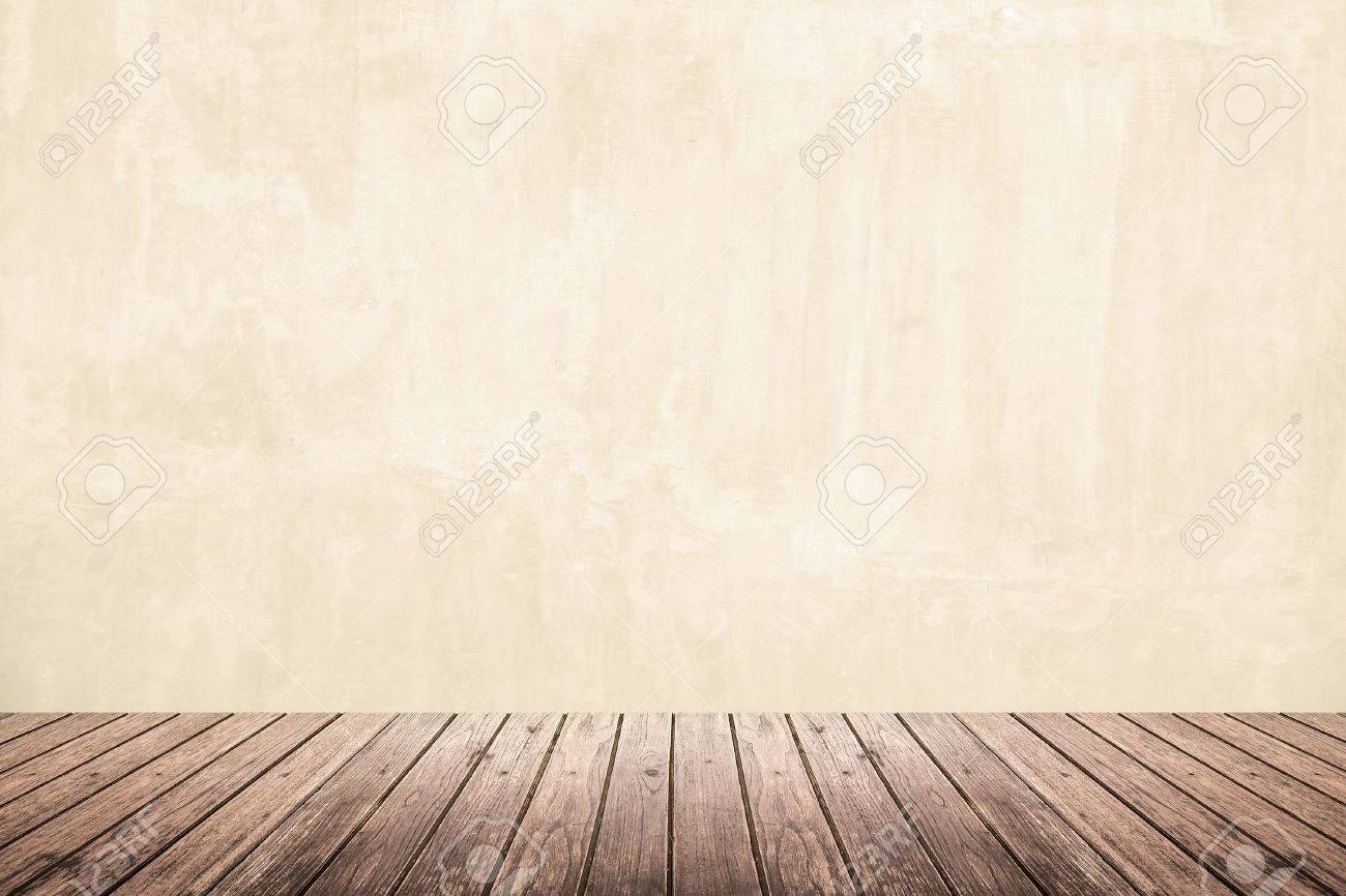 古いグランジ ベージュ コンクリート壁と暗い茶色の木の床の部屋を空に インテリアの背景や背景を使う の写真素材 画像素材 Image