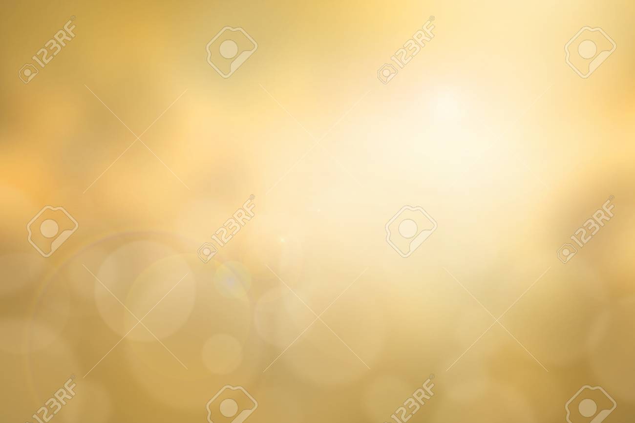 Abstract yellow sunset blurred background with bright sunlight, flare and bokeh effect, use for backdrop or design element in summer environment concept - 54827127 Abstract yellow sunset blurred background with bright sunlight, flare and bokeh effect, use for backdrop or design element in summer environment concept - 54827127