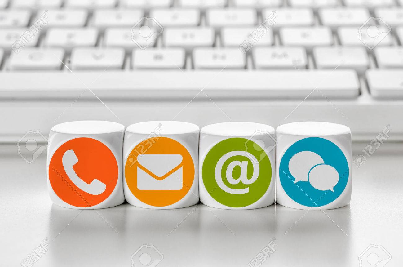 Letter dice in front of a keyboard - Contacting - 54780253 Letter dice in front of a keyboard - Contacting - 54780253