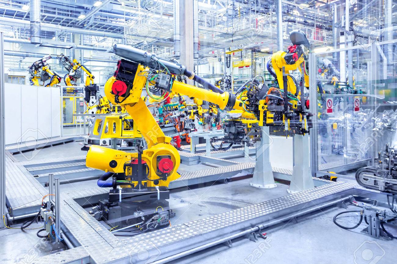 robotic arms in a car plant - 53747788 robotic arms in a car plant - 53747788