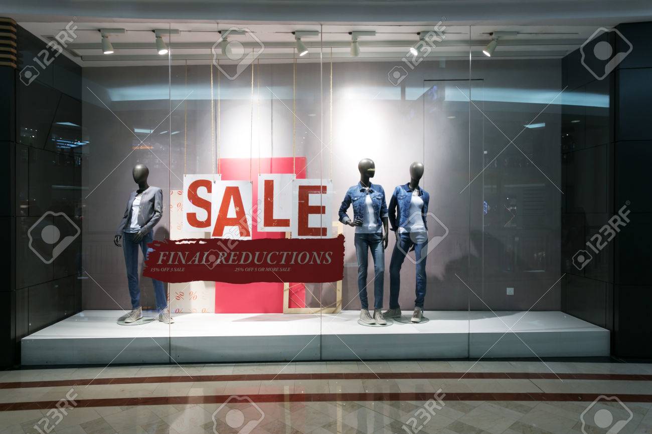 Fashion Clothes Shop Display Window And Sale Sign. Фотография, картинки,  изображения и сток-фотография без роялти. Image 34507288.