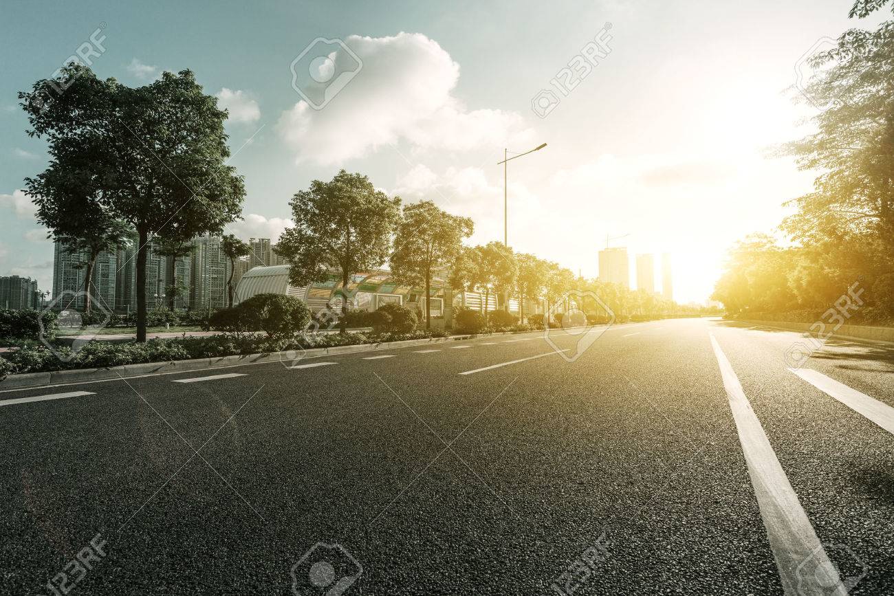 empty asphalt road with trees under sunshine - 45528152 empty asphalt road with trees under sunshine - 45528152