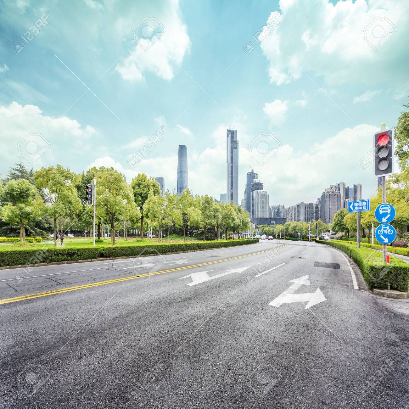 empty street with trees aside and skyscrapers as background - 45548657 empty street with trees aside and skyscrapers as background - 45548657