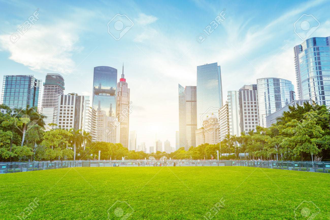 modern skyscrapers as background of a public green space - 45548671 modern skyscrapers as background of a public green space - 45548671