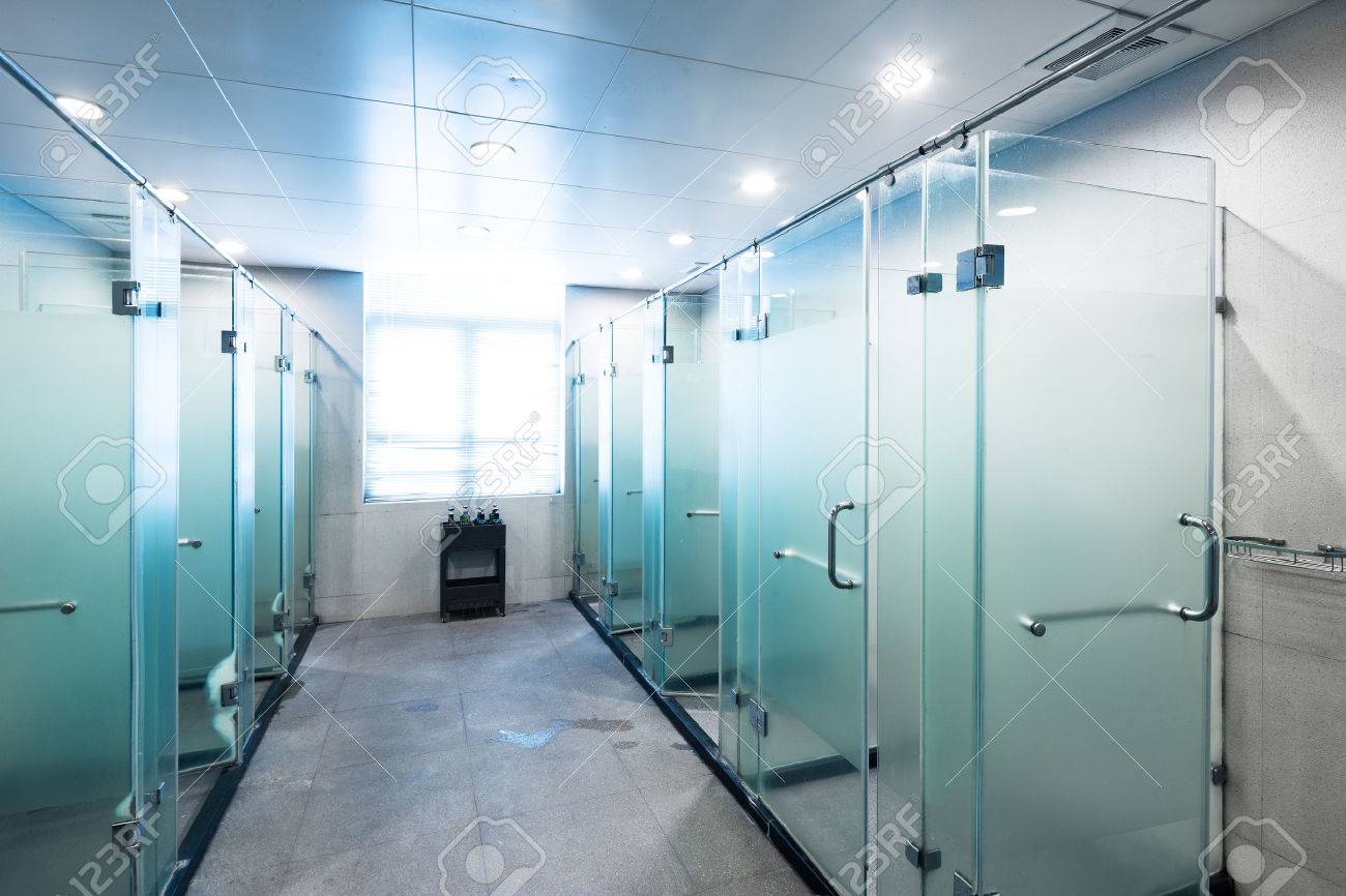 shower with glass in bathroom of gym - 65921037 shower with glass in bathroom of gym - 65921037