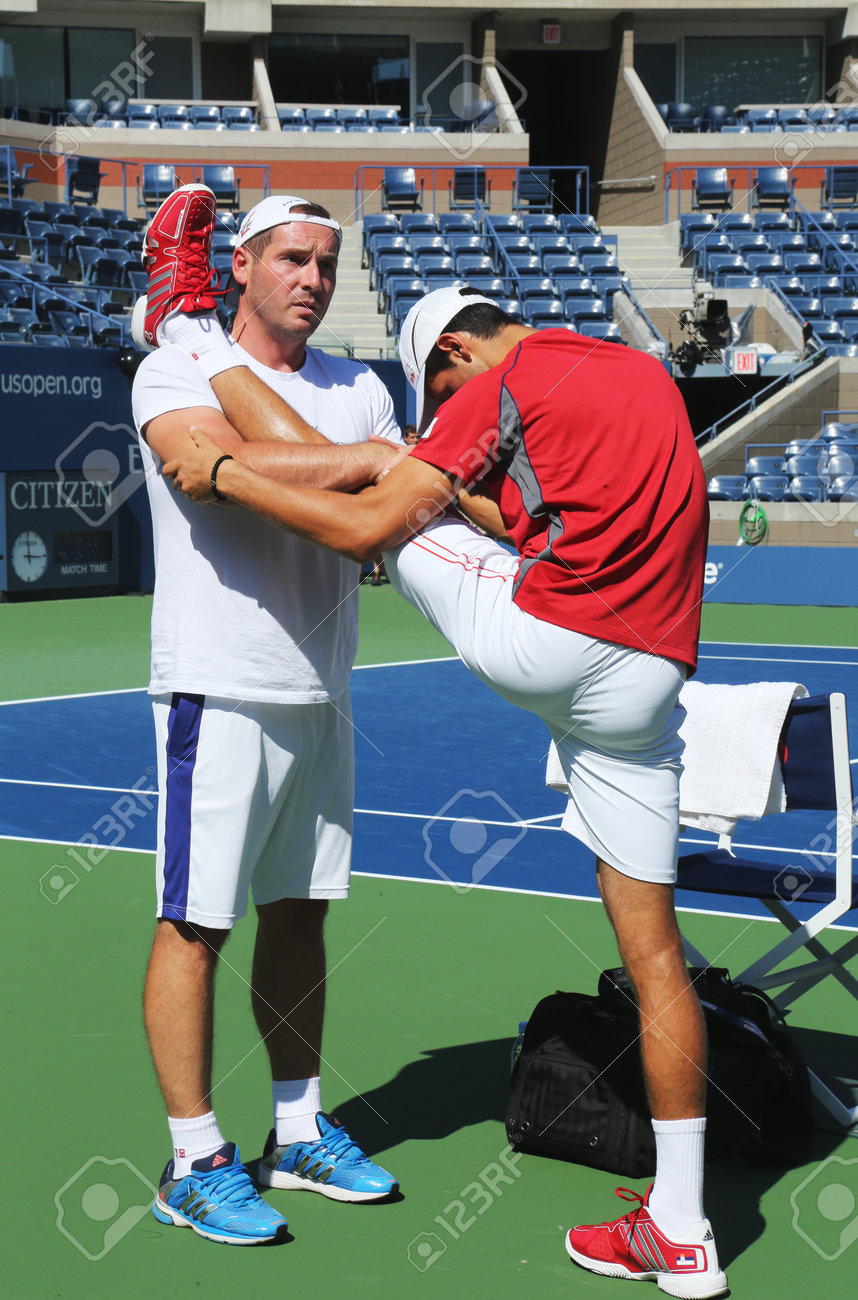 24763641-new-york-august-25-six-times-grand-slam-champion-novak-djokovic-stretching-before-practice-for-us-op.jpg