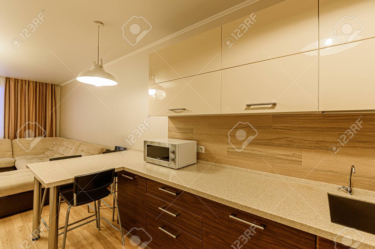 Russia, Moscow- February 07, 2020: interior room apartment modern bright cozy atmosphere. general cleaning, home decoration, preparation of house for sale. kitchen, dining area - 152628294 Russia, Moscow- February 07, 2020: interior room apartment modern bright cozy atmosphere. general cleaning, home decoration, preparation of house for sale. kitchen, dining area - 152628294